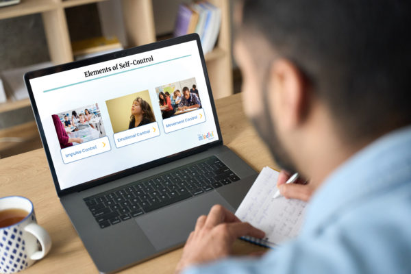 Man sitting in the laptop and learning course block about Elements of self-control