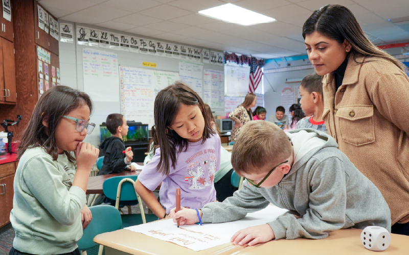 Interactive Learning Promotes Cooperation