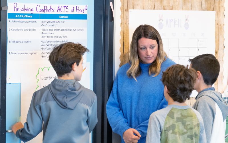 Interactive Learning Promotes Cooperation